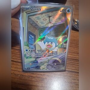 Pokemon Quaxly Card with Holographic Blue and White